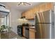 Functional kitchen with stainless steel appliances and granite countertops at 1416 N Downing St # 1, Denver, CO 80218