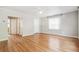 Inviting living room with original hardwood floors and neutral paint at 1416 N Downing St # 1, Denver, CO 80218
