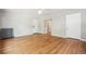 Spacious living room boasts hardwood flooring, radiator heating and neutral walls ready for any design style at 1416 N Downing St # 1, Denver, CO 80218