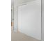 Large sliding closet door in a bedroom with neutral carpet at 4127 S Lewiston Cir, Aurora, CO 80013