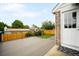 Relaxing deck with a view of the yard and easy access to the house at 4127 S Lewiston Cir, Aurora, CO 80013