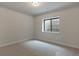 Basement bedroom with carpet and an egress window at 461 Muirfield Cir, Louisville, CO 80027