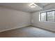 Basement bedroom with carpet and an egress window at 461 Muirfield Cir, Louisville, CO 80027