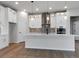 Stylish kitchen with a large island, stainless steel appliances, and ample storage at 461 Muirfield Cir, Louisville, CO 80027