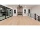 Spacious living room with a modern fireplace and large sliding doors at 461 Muirfield Cir, Louisville, CO 80027