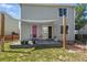 Backyard featuring a deck, lawn, and light gray siding at 11898 W Tufts Pl, Morrison, CO 80465