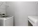 Laundry room with washer, dryer and white walls at 11898 W Tufts Pl, Morrison, CO 80465