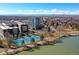 Scenic aerial view of the building, park, tennis courts, and cityscape in the background at 4200 W 17Th Ave # 235, Denver, CO 80204