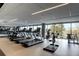 Bright gym featuring state-of-the-art treadmills with scenic views, and various other workout equipment at 4200 W 17Th Ave # 235, Denver, CO 80204