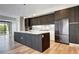 Stunning kitchen with stainless appliances, a center island, and an open layout for easy meal prep at 4200 W 17Th Ave # 235, Denver, CO 80204
