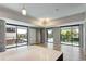 Bright living area with hardwood floors and large windows offering views of the outside at 4200 W 17Th Ave # 235, Denver, CO 80204
