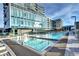 Stunning outdoor pool with a sleek design, set against a backdrop of a modern high-rise building at 4200 W 17Th Ave # 235, Denver, CO 80204