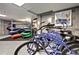 Storage room with kayaks, paddle boards, life vests and a row of new bikes for residents to use at 4200 W 17Th Ave # 235, Denver, CO 80204