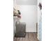 Laundry room with washer, dryer, and ample shelving at 6013 Castlegate Dr # D33, Castle Rock, CO 80108