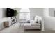 Spacious living room with large window and sectional sofa at 6013 Castlegate Dr # D33, Castle Rock, CO 80108