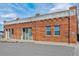 Classic brick exterior showing vintage 'Mountain States Telephone' signage above the windows at 1111 Osage St # 29, Denver, CO 80204