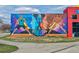 Exterior mural on building at 1111 Osage St # 29, Denver, CO 80204