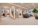 Finished basement offering an open floorplan with a living area and staircase at 2673 S Cook St, Denver, CO 80210