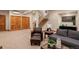 Spacious finished basement featuring recessed lighting and a comfortable seating area at 2673 S Cook St, Denver, CO 80210