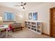 Bedroom features bookshelves and room for activities at 2673 S Cook St, Denver, CO 80210