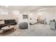 Finished basement with a bedroom space, living space, and neutral carpet, ready for entertaining at 717 S Carr Ave, Lafayette, CO 80026