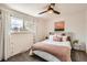 Serene bedroom featuring a ceiling fan, neutral tones, and a soft carpet for added comfort at 717 S Carr Ave, Lafayette, CO 80026