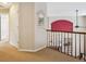 Second story hallway with a view overlooking the living room, with plenty of natural light at 10440 Lowell Ct, Westminster, CO 80031