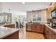 This lovely kitchen has stainless steel appliances, wood floors, and a lovely breakfast nook at 10440 Lowell Ct, Westminster, CO 80031
