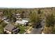 Aerial view of the home in its neighborhood, with mature trees and well-kept streets at 2235 Eaton St, Edgewater, CO 80214