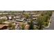 Neighborhood view featuring mature trees, Sloan Lake, and Edgewater Market nearby at 2235 Eaton St, Edgewater, CO 80214