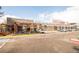 Commercial building featuring diverse culinary and retail options for shoppers, along with ample parking at 2235 Eaton St, Edgewater, CO 80214