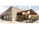 Outdoor dining at Adelitas Cocina Y Cantina with a 'Now Open' sign at 2235 Eaton St, Edgewater, CO 80214