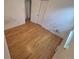 Bedroom features include a standard closet and hardwood flooring in need of repair at 867 S Grape St, Denver, CO 80246
