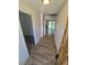 Inviting entryway featuring wood-look flooring that continues through the home and leads to the living spaces at 867 S Grape St, Denver, CO 80246