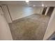 Bright finished basement offers carpeted floors and recessed lighting at 867 S Grape St, Denver, CO 80246