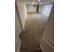 Large finished basement space with neutral carpeting and white walls at 867 S Grape St, Denver, CO 80246