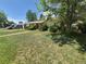 Single-story house with brick and siding, showing mature landscaping and a driveway to an attached one-car garage at 867 S Grape St, Denver, CO 80246