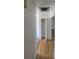 Hallway with closet and wood floor at 867 S Grape St, Denver, CO 80246