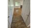 View from doorway into living room with hardwood floors and neutral wall paint at 867 S Grape St, Denver, CO 80246
