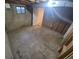 Unfinished basement features concrete walls and exposed ceiling beams at 867 S Grape St, Denver, CO 80246