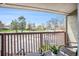 Charming balcony with comfortable seating provides open and beautiful views of the surrounding neighborhood at 5300 E Cherry Creek South Dr # 1327, Denver, CO 80246