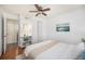 Comfortable bedroom with ceiling fan, bright window, and modern decor at 5300 E Cherry Creek South Dr # 1327, Denver, CO 80246