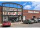 A World Market retail store with a brick facade and large storefront windows for shopping at 5300 E Cherry Creek South Dr # 1327, Denver, CO 80246