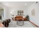 Comfortable living room with modern furnishings, stylish decor, and a private balcony at 5300 E Cherry Creek South Dr # 1327, Denver, CO 80246