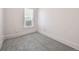 Bedroom featuring soft gray carpet and neutral walls at 805 S Lincoln St, Denver, CO 80209