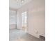 Bedroom with neutral walls and carpet, plus bright natural light from the window at 805 S Lincoln St, Denver, CO 80209
