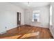 Cozy living room featuring hardwood floors and modern chandelier at 805 S Lincoln St, Denver, CO 80209
