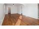 Spacious living room with hardwood floors, neutral walls, and an open layout at 805 S Lincoln St, Denver, CO 80209