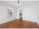 Bright living room featuring hardwood floors and ceiling fan at 805 S Lincoln St, Denver, CO 80209