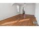 Bright living room featuring gleaming hardwood floors and abundant natural light at 805 S Lincoln St, Denver, CO 80209